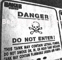 danger warning sign contaminated water and fumes