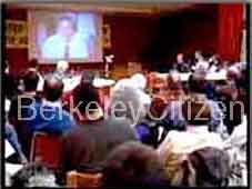 audience watching Lab Director Charles Shank 's  video presentation