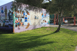 Ohlone Park East utility building and Ohlone mural